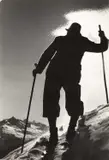 Paul Wolff, Skier in backlight in the Ötztal Alps, c. 1920s, Vintage silver print on double-weight ferrotyped paper, in good condition. Photographer's stamp "Dr. Paul Wolff, Frankfurt am Main", several handwritten numbers, "Ag. Schostal" agency label with handw