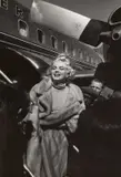 Manfred Linus Kreiner, Marilyn Monroe arriving at Chicago to promote 'Some like it hot, 1959, Vintage silver print on double-weight semi-matte paper, in very good condition. Photographer's stamp with address "735 Kappock Street, New York 63" on the reverse. Deutsch: Vintage-Silbergelatineabzug