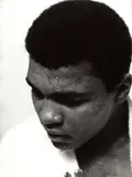 Alberto Durazzi, Mohammed Ali after his fight against Brian London, London 1966, 1966, Silver print, printed later on semi-matte paper, in excellent condition. Photographer's "Dufoto" agency copyright stamp with address at "Via del Corso, 184 - 00186 Roma", annotated"102330 IJ" and "Moh