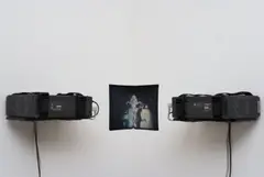 Paul Pfeiffer, Live Evil (Bucharest), 2004, 2 digital video loops (50 second loop), 2 metal armatures, 2 projectors, 2 DVD players, frame synchronizer