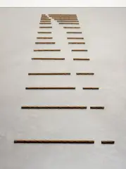 Carl Andre, 32-Part Reciprocal Invention (RS 1971-20), 1971, material: steel reinforcing rod number and configuration of elements: 32-unit rectangular field on floor, 16 parallel rows of 2 segments with interval each row, intervals between parallel rows determined reciprocally by lengths of segments