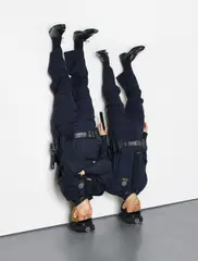 Frank and Jamie by Maurizio Cattelan, 2002, polyester resin, wax, pigment, human hair, clothing, shoes and accessories, sold Nov 2015