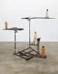 Thomas Schütte, Maschine, 1993, 4 wax figures, wood, fabric, metal armature, electric motor and rubber gasket