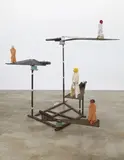 Thomas Schütte, Maschine, 1993, 4 wax figures, wood, fabric, metal armature, electric motor and rubber gasket