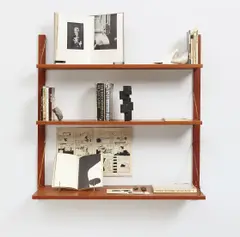 Innerspace Bullshit by Carol Bove, 2007, 14 books, comic book, letter, bronze sculpture, Marfa rock, ocean ephemera, mirror and pamphlet on wood and metal shelve, sold Nov 2015