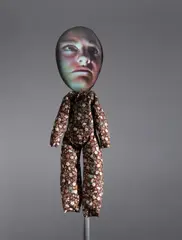 Crying Doll (Floral #2) by Tony Oursler, 1993, sewn cloth, tripod, v332 projector, DVD, and a Panasonic S29 DVD player, sold Nov 2015
