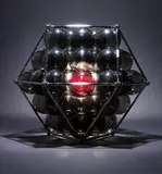 Buckminster Fuller, Closest Packing of Spheres, 1980, Chrome plated steel rods, molded thermoplastic connectors, smoked grey acrylic spheres around red acrylic sphere multiple,