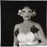 Lady at a masked ball with two roses on her dress, N.Y.C. by Diane Arbus, 1967, Gelatin silver print, printed later by Neil Selkirk, offered Apr 2015