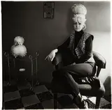 Lady bartender at home with souvenir dog, New Orleans by Diane Arbus, 1964, Gelatin silver print, printed later by Neil Selkirk, sold Apr 2015