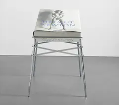 SUMO by Helmut Newton, Monte Carlo: Taschen, 1999. Oversized photography book with original metal stand designed by Philippe Starck, sold Oct 2015