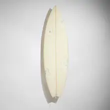 Daniel Arsham, Eroded Surfboard, 2021, resin, fiberglass, quartz crystals and selenite surfboard