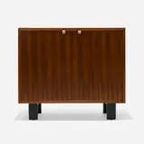 Cabinet, model 4625 by George Nelson & Associates, c. 1952, walnut, lacquered wood, aluminum, sold Feb 2026
