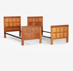 Robert 'Mouseman' Thompson, Pair of oak single beds, c.1930s, and cast iron rails