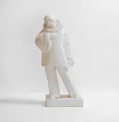 Eugène Riboulet, French Art Deco bisque figure of a clown, c.1930s