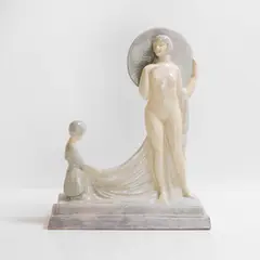 Gaston Deblaize, Art Deco cream-glazed figure group, c.1930