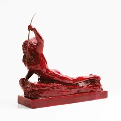 Marcel Bouraine, Rare French Art Deco red-glazed figure of a Native American, c.1920s