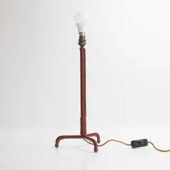 Jacques Adnet, Table lamp, c.1955, hand-stitched red leather over a brass frame
