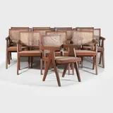 'Set of twelve model 'PJ-010102T King’ office chairs by Pierre Jeanneret, c.1955, each of teak with the seat and backrest in braided canework, sold Oct 2025