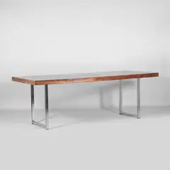 Gordon Russell, Rosewood 'Series 1' desk, c.1970s, the rosewood top raised on two 'U'-shaped chrome supports