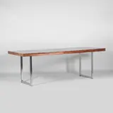 Gordon Russell, Rosewood 'Series 1' desk, c.1970s, the rosewood top raised on two 'U'-shaped chrome supports