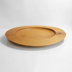 Turned oak charger by Anthony Bryant, 2001, inscribed to base 'ANTHONY BRYANT. OAK. 2001.', sold Oct 2025