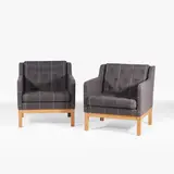 Erik Ole Jørgensen, Pair of 'EJ315' club chairs, 1975, each upholstered in charcoal-grey striped wool