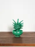 Vase et plante succulente n. 2470 by Napoleone Martinuzzi, A '2470' vase and succulent plant in pulegoso tinted glass designed by Napoleone Martinuzzi and executed by Venini & C, offered Apr 2025