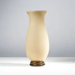 Vase balustre by Tomaso Buzzi, A labeled baluster vase in incamiciato tinted glass and gold leaf designed by Tomaso Buzzi circa 1934 and executed by Ve, offered Apr 2025