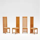 Frank Lloyd Wright, for Cassina, circa 1986, Cherry wood, of high backed construction, the slatted backrests over seats upholstered in beige fabric, raised on square supports