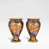 Daisy Makeig-Jones, for Wedgwood, circa 1925, Porcelain, decorated with a landscape scene with gilt details, against an orange lustre ground