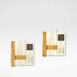 Gio Ponti, for Lumi, Gilt brass and enamel, decorated with gilt brass rods and enamelled panels against a white enamelled back