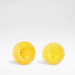 for Whitefriars by Geoffrey Baxter, Cast yellow glass, moulded in relief with sun masks, sold Jun 2025