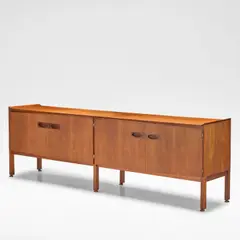 Arne Hovmand-Olsen, for Mogens Kold Mobelfabrik, circa 1960, Teak, the rectangular top over two pairs of cabinet doors, each opening onto shelving and drawers