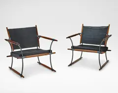 Pair of 'conical-stick' chairs, designed 1966 by Jens Quistgaard, Indian rosewood, chromium-plated metal, sold Oct 2024