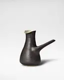 Pouring vessel by Lucie Rie, circa 1955, Stoneware, manganese glaze, white glaze to interior, sold Oct 2024