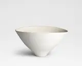 Conical bowl by Lucie Rie, circa 1980, Porcelain, matte white glaze, sold Oct 2024