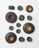 Lucie Rie, Thirteen buttons