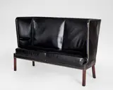 Frits Henningsen, High-backed sofa, circa 1936, Leather, Cuban mahogany, metal studs