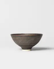 Lucie Rie, Flaring bowl, circa 1972, Porcelain, manganese glaze with sgraffito design