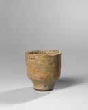 Small pot by Lucie Rie, circa 1956, Stoneware, light blue and brown volcanic glaze, sold Apr 2024