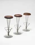 Piet Hein, Set of three bar stools, model no. FL 9511, designed 1961, produced 1974, Chromium-plated tubular metal, chromium-plated metal, leather