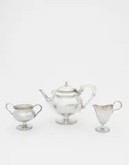 Omar Ramsden, Three-piece tea set, 1923, Sterling silver, resin