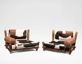 Pair of rare armchairs, designed for the Penthouse flat, Highpoint Two, Highgate, London by Berthold Lubetkin and Margaret Lubetkin, 1936-1938, Norwegian yew, sandblasted pine, cowhide, leather, chromium-plated metal, sold Apr 2024