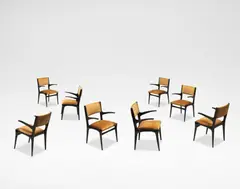 Set of eight armchairs, model no. 585 by Carlo De Carli, circa 1955, Painted chestnut, fabric upholstery, sold Apr 2024