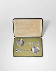 Oliver Baker, Pair of 'cymric' spoons, 1902, Silver