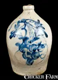 COWDEN & WILCOX / HARRISBURG, PA Stoneware Jug with Grapes by Cowden & Wilcox, circa 1865, Stoneware, sold Jul 2010