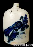 N.A. WHITE & SON / UTICA NY Stoneware Jug with Paddletail Bird, Five-Gallon. by N.A. White & Son, circa 1885, Stoneware, sold Apr 2010