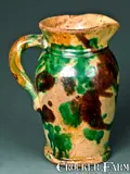 S. BELL & SON / STRASBURG, VA Redware Creamer by S. Bell & Son, circa 1890, Redware, sold Jan 2010