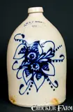 E. & L.P. NORTON / BENNINGTON, VT Stoneware Jug with Bright Floral Decoration by E & L P Norton, circa 1870, Stoneware, sold Oct 2009
