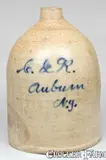 Auburn, NY Advertising Stoneware Jug by J. FISHER / LYONS, NY by J. Fisher, circa 1875, Stoneware, sold Jul 2009